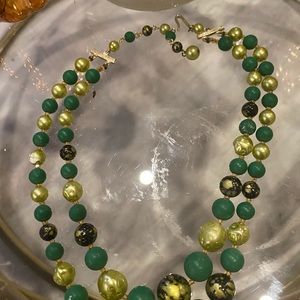 Vintage necklace with green balls.